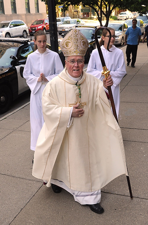 Bishop Richard Malone makes his way into St. Joseph Cathedral for the Ordination Mass. (Dan Cappellazzo/Staff Photographer)